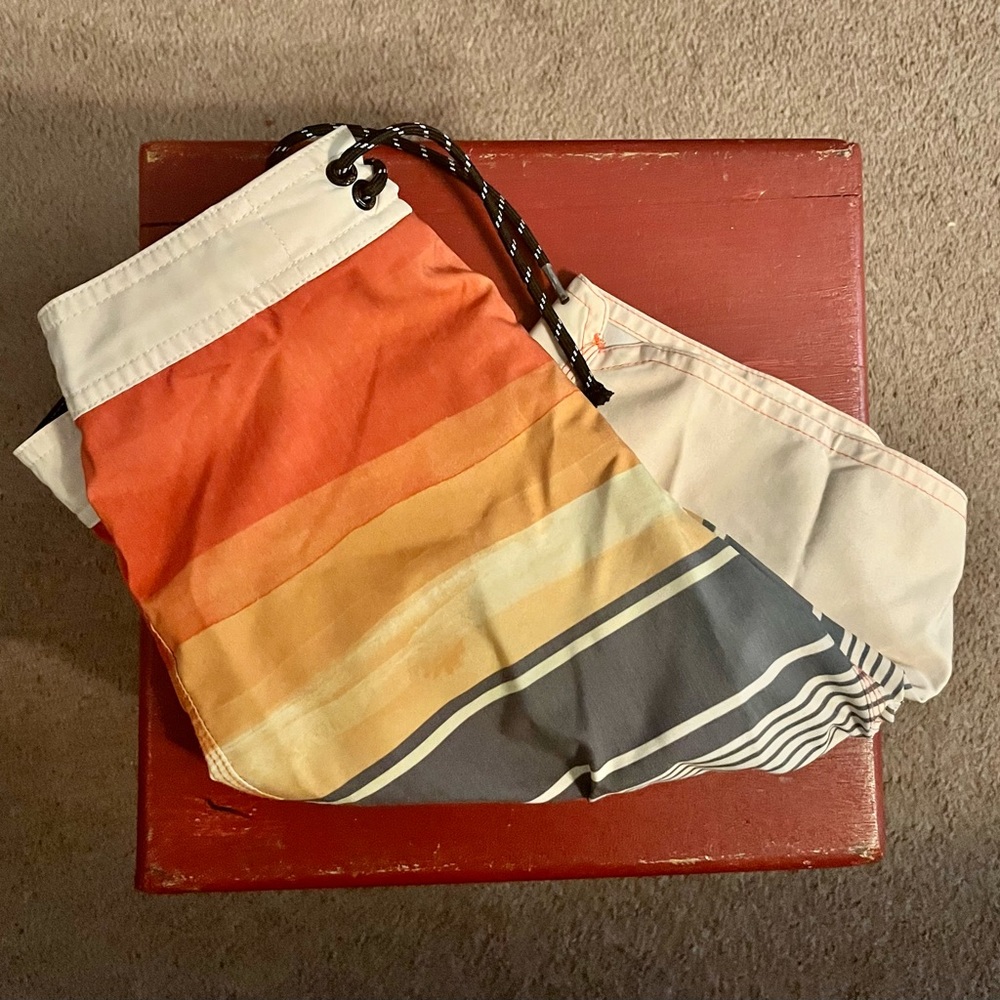 Multi-color Boys O’Neill board shorts, size 12